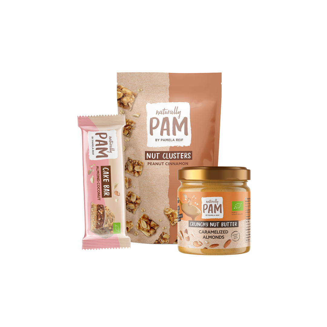 Verschiedene Süßigkeiten im Naturally Pam Sweet Moments Bundle, bunt verpackt auf einem weißen Hintergrund.