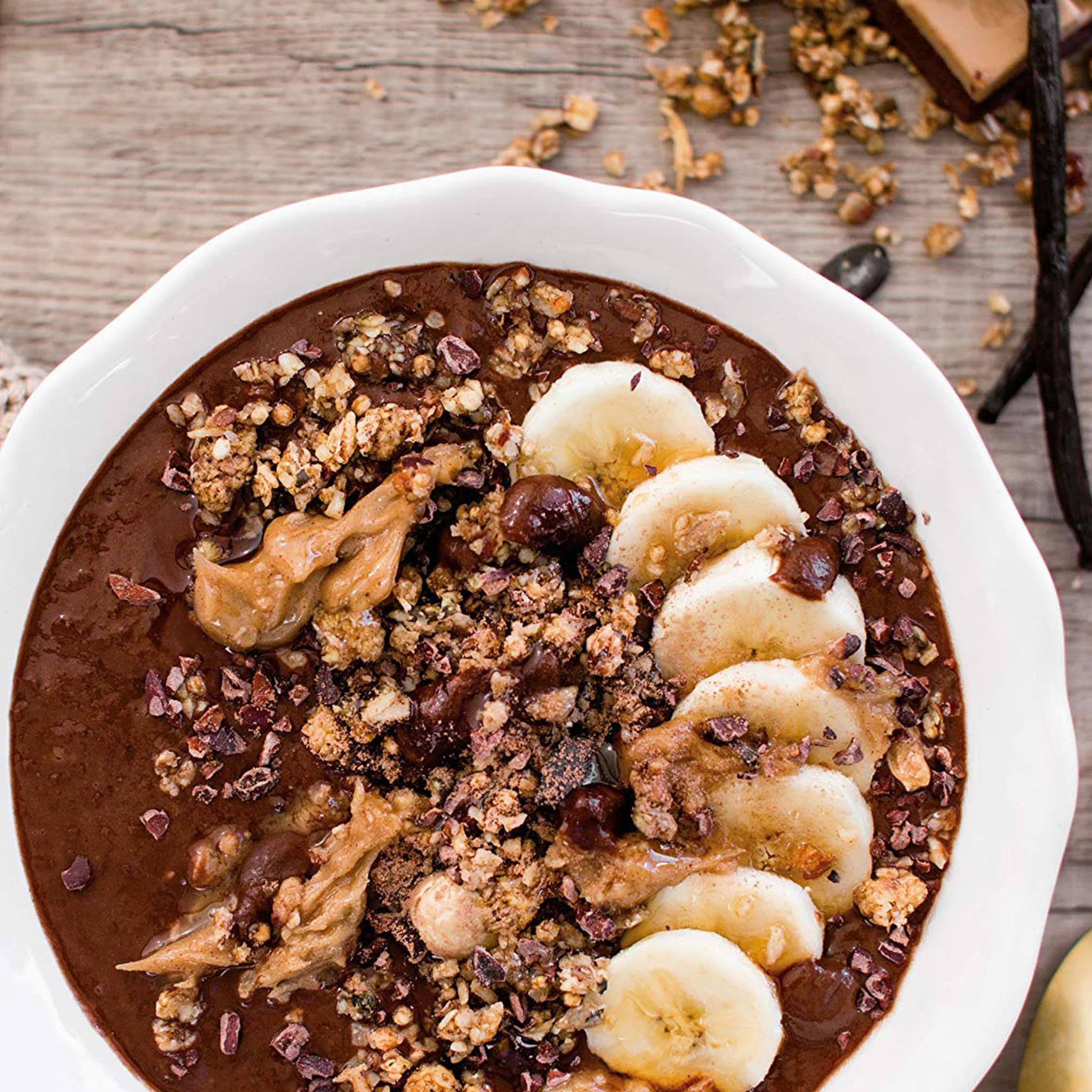 Buchcover des Naturally Pam Bowl-Kochbuchs mit bunten Obst- und Gemüsesymbolen, im natürlichen Stil gestaltet