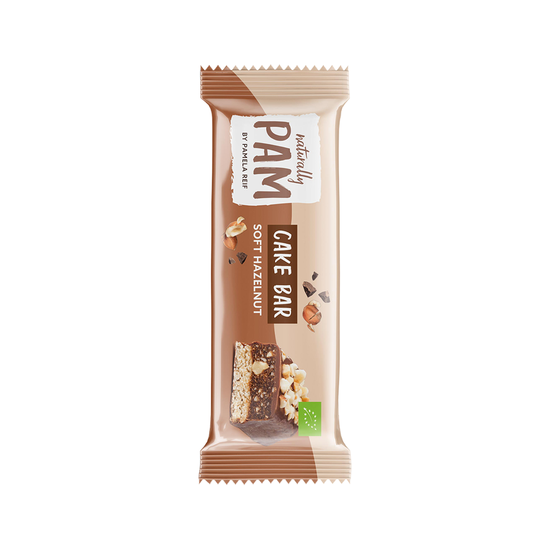 Weicher Hazelnut-Kuchenriegel von Naturally Pam, mit Nüssen und cremiger Textur, ideal als Snack oder Energiequelle.