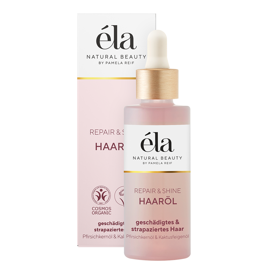 Natürliches éla Natural Beauty Haaröl von Naturally Pam in einer Flasche mit goldener Verpackung, ideal für glänzendes Haar.