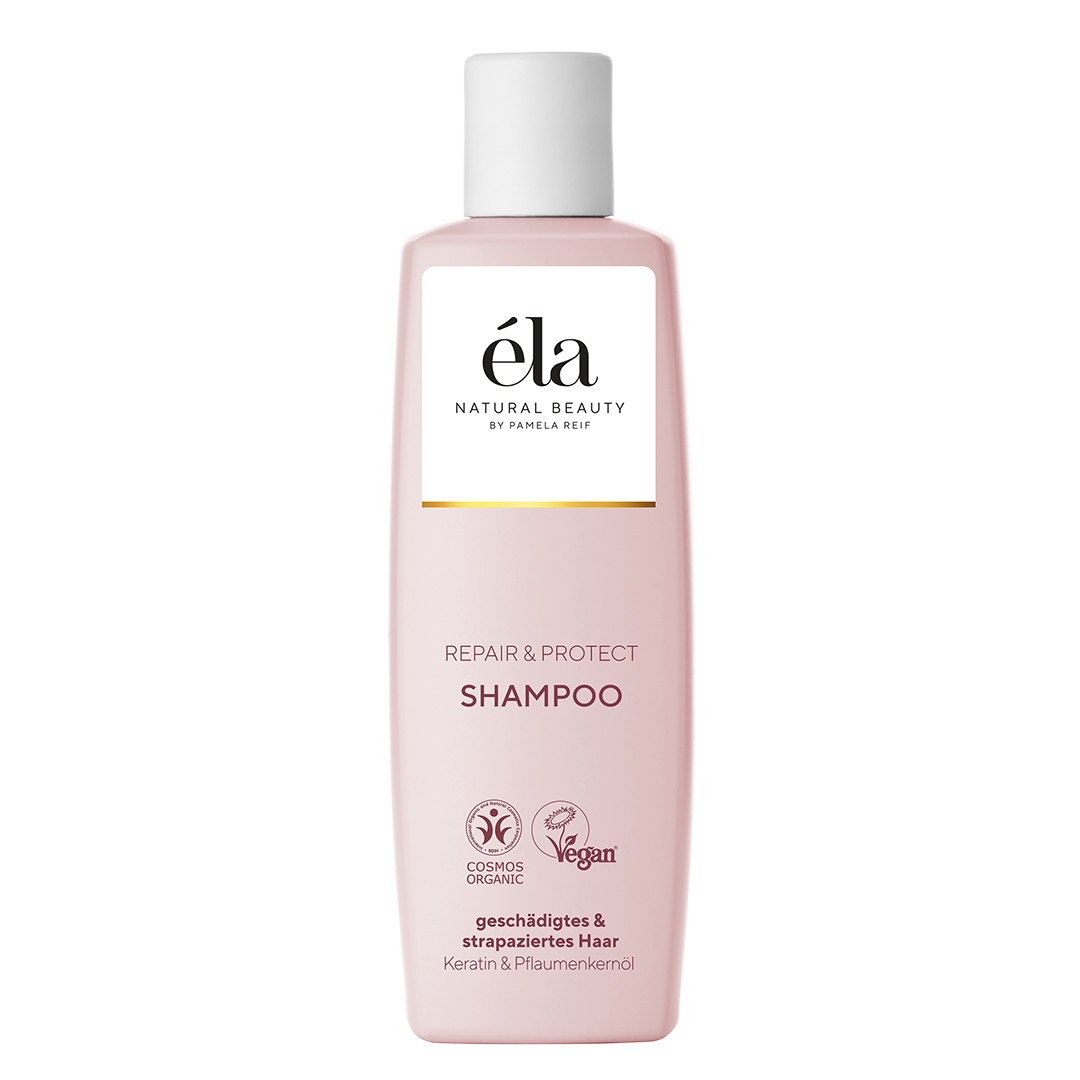 Éla Natural Beauty Shampoo Repair & Protect von Naturally Pam, flüssiges Shampoo in einer weißen Flasche, für gesundes, glänzendes Haar.