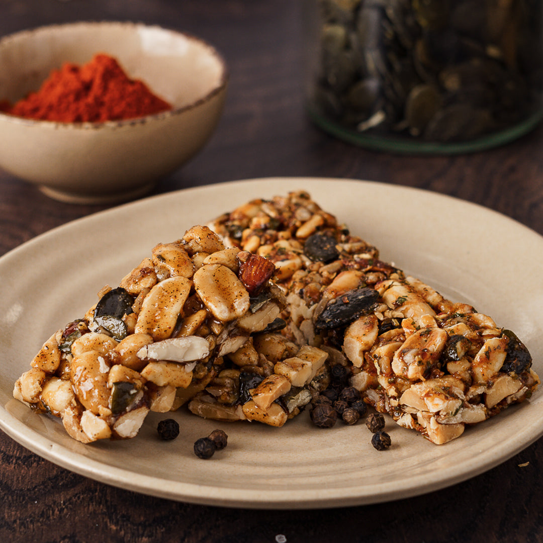 Natürlich Pam Salty Bar im Pizza-Stil, knusprige Snack-Riegel mit herzhaftem Geschmack, ideal für unterwegs.
